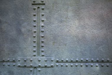 Grunge metal plaka perçin ile arka plan olarak