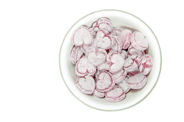 Herzförmige Bonbons in einer kleinen Schüssel — Stockfoto