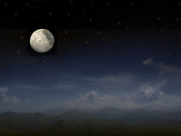 Moon over mountain peaks