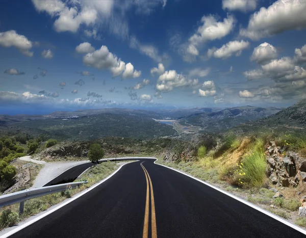 Asphalted road on a clear sunny day — Stock Photo, Image