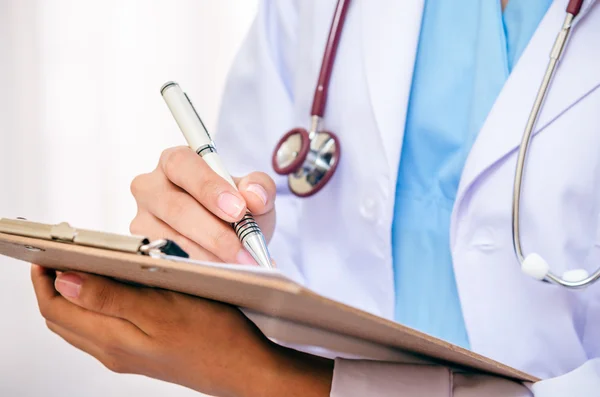 Doctor writing — Stock Photo, Image