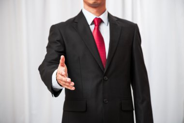 işadamı elimi sıktı elleri