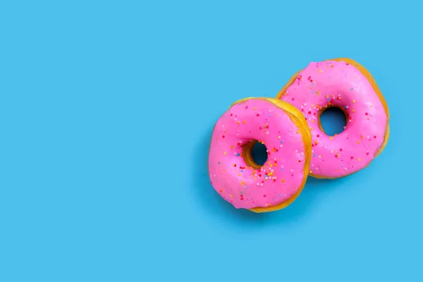 Rosa Donuts Auf Blauem Hintergrund Ansicht Von Oben — Stockfoto