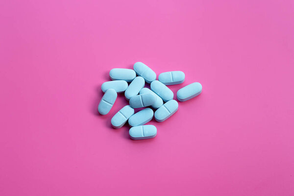 "PrEP" ( Pre-Exposure Prophylaxis). used to prevent HIV on pink background.