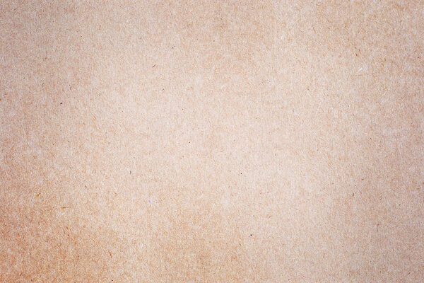 Лист коричневой бумаги или картонной текстуры для фона.