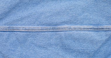 Arkaplan için mavi kot kumaşını kapat.