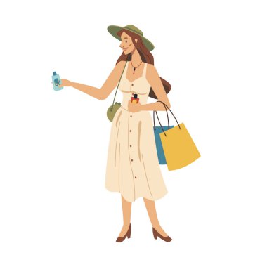 Ellerinde krem olan kadın kozmetik ürünleri seçiyor.