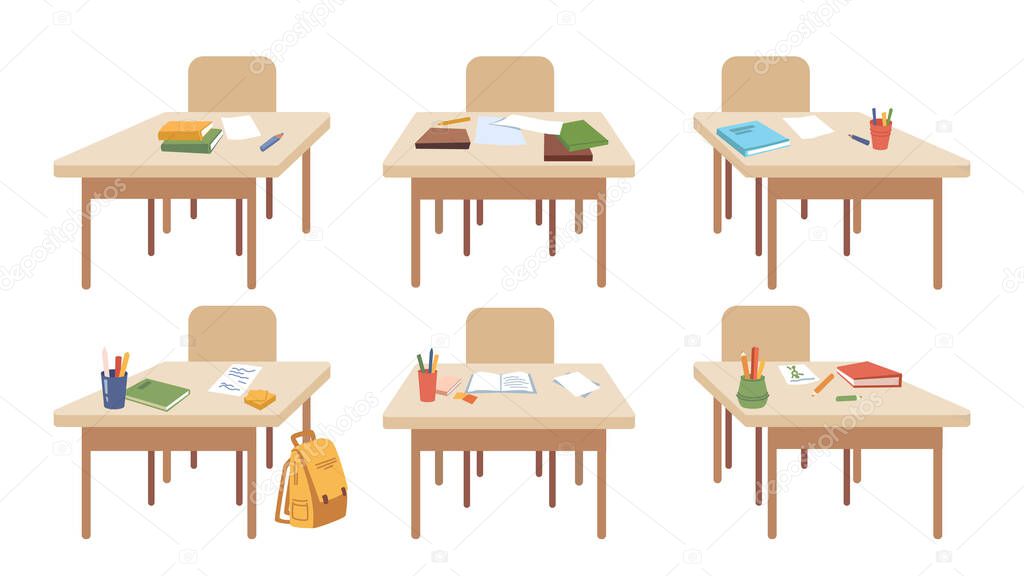 Empty classroom desks with school supplies set