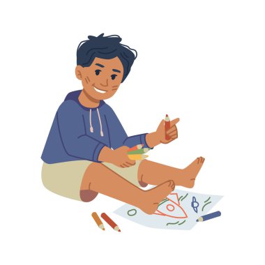 Çocuk pastel boyalarla uzay gemisini kağıda çiziyor.