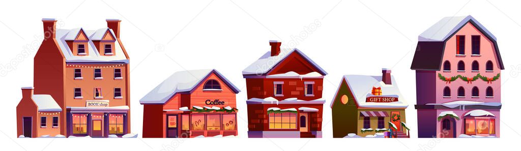 Set of Christmas street decorated houses in snow