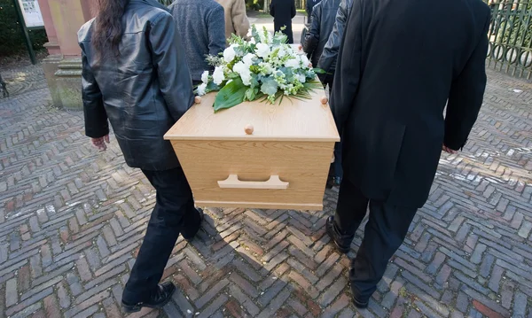 Carrying a coffin — Stock Photo, Image