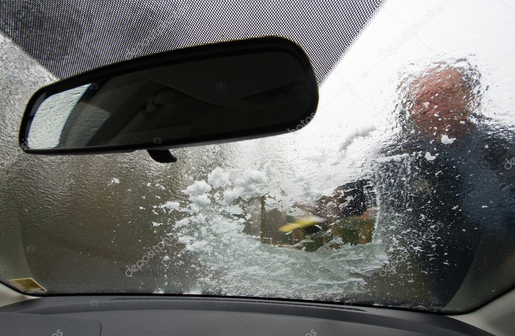 Scraping windscreen during winter