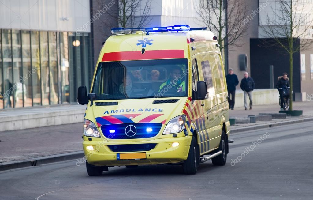 Ambulance with lights on Stock Editorial Photo © Buurserstraat38