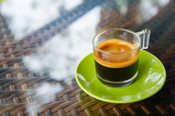 Hot coffee on table — Stock Photo, Image