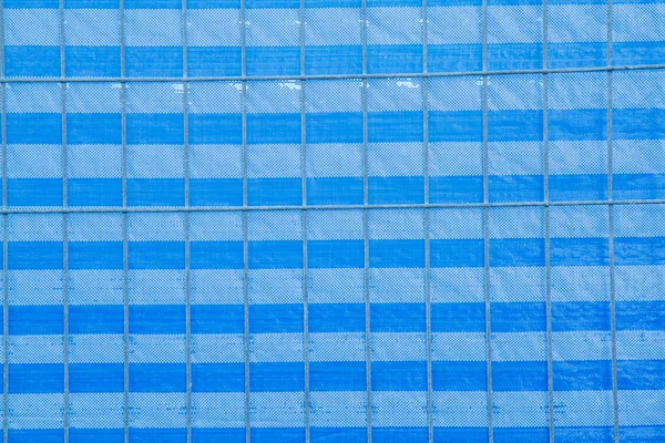 Синій пластиковий білий фон — стокове фото