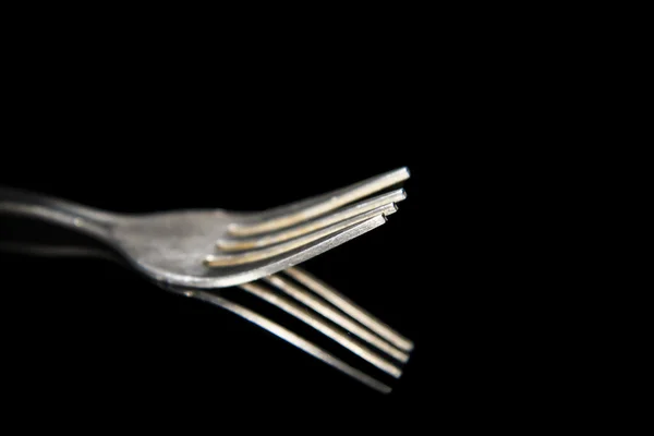 Fork isolated on a black background — Stock Photo, Image