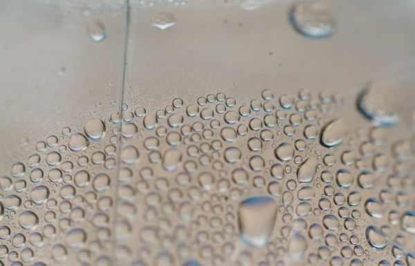 Gotas de agua sobre vidrio —  Fotos de Stock