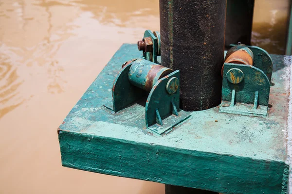 Old roller wheel for dock level adjustment — Stock Photo, Image