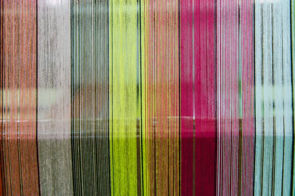 Surové hedvábí vlákna barvu pro pozadí. — Stock fotografie