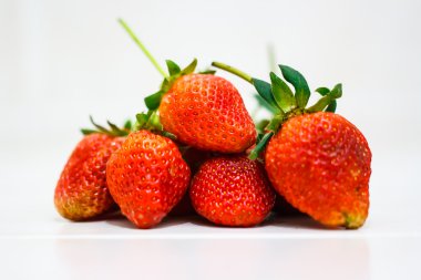 Strawberry berries on a white background.