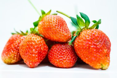 Strawberry berries on a white background.