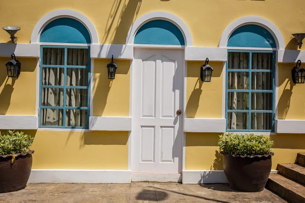 Wood white door on brick wall — Stock Photo, Image