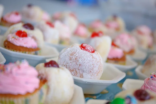 Donut and cup cake on table — Stock Photo, Image