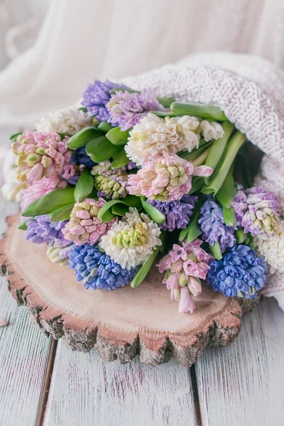 Bouquet of hyacinth on wooden boards — Stock Photo, Image