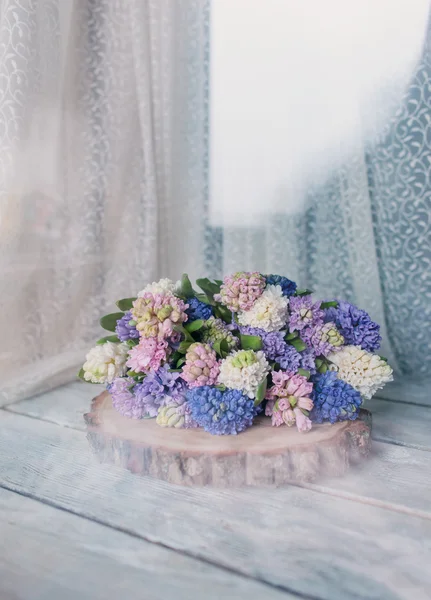 Bouquet of hyacinth on wooden boards — Stock Photo, Image