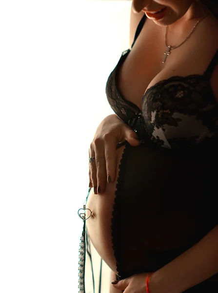 Hamile kadının karnı. — Stok fotoğraf