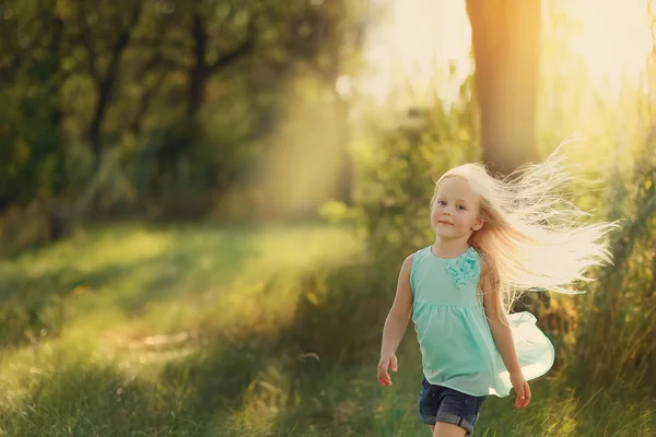 Girl in a summer forest — Stock Photo, Image