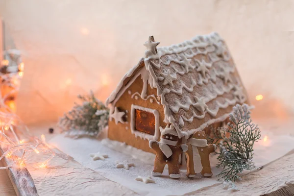 Gingerbread cookie and decorations on holiday table. — Stock Photo, Image