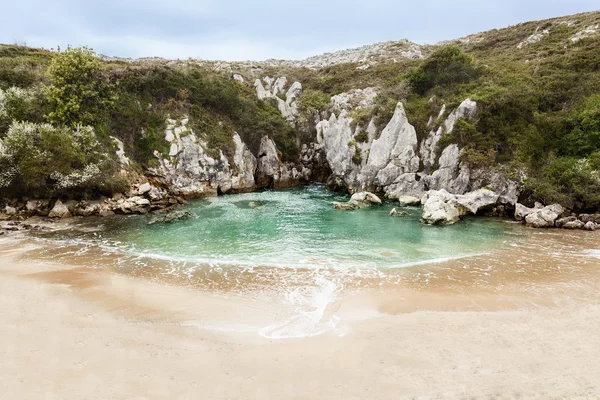 Gulpiyuri beach Stock Kép