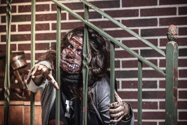 Close-up portrait of a scary bloody zombie girl — Stock Photo, Image