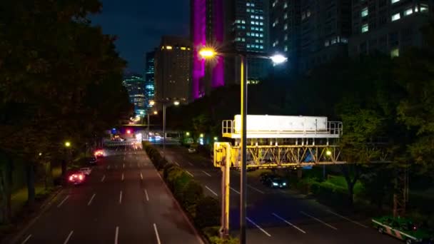 En natt timelapse av stadens gata i Shinjuku bred skott zoom — Stockvideo