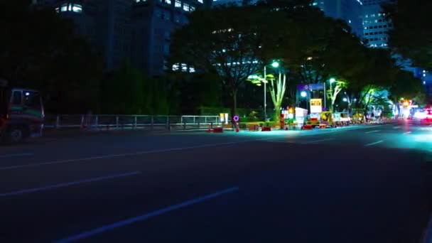 Un timelapse notte della strada urbana della città a Shinjuku panning colpo largo — Video Stock