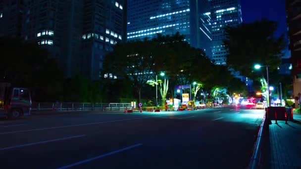 Ein nächtlicher Zeitraffer der urbanen Stadtstraße in Shinjuku — Stockvideo