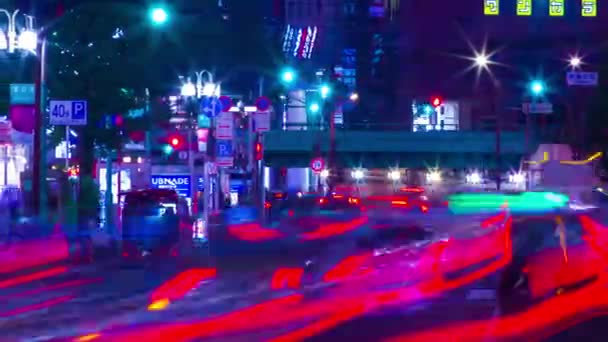 Uma noite timelapse da rua neon em Shinjuku tiro longo panning — Vídeo de Stock