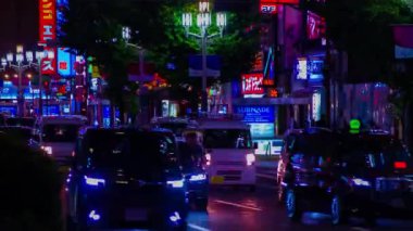 Shinjuku 'daki neon sokağının bir gece zamanlaması.