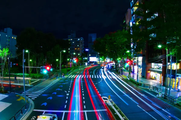 Een avond neon straat in Shibuya breed schot — Stockfoto