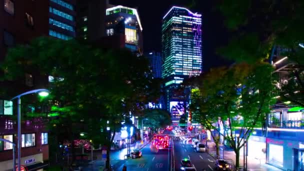 Un lapso de tiempo nocturno de la calle de neón en Shibuya panorámica de tiro ancho — Vídeos de Stock