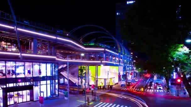 A night timelapse of the neon street in Shibuya wide shot panning — Stock Video