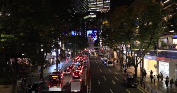 Una calle de neón noche en Shibuya tiro ancho — Vídeos de Stock