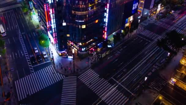 Un lapso de tiempo nocturno del cruce de Sukiyabashi en Ginza panorámica de gran angular — Vídeo de stock