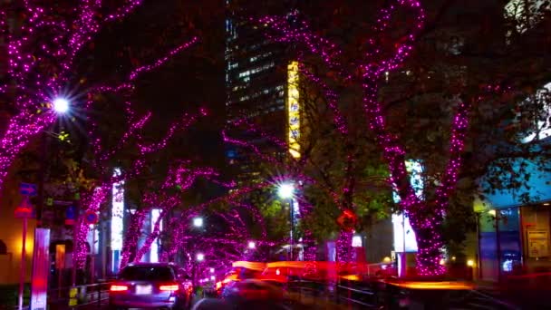 Un lapso de tiempo nocturno de la calle iluminada en Shibuya panorámica — Vídeo de stock