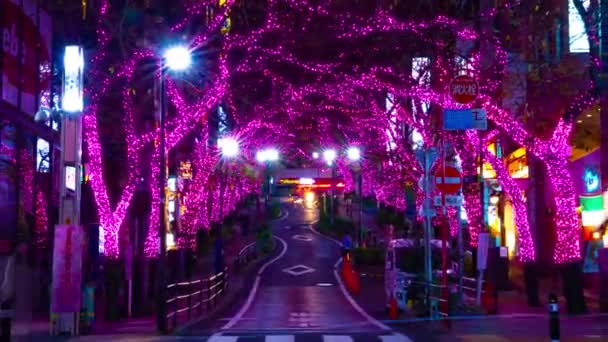 Een avond timelapse van de verlichte straat in Shibuya zoom — Stockvideo