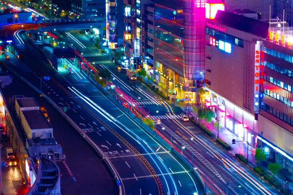 A night traffic jam at the crossing in Ginza long shot high angle. Chuo district Ginza Tokyo Japan - 11.19.2020 It is called Sukiyabashi crossing.