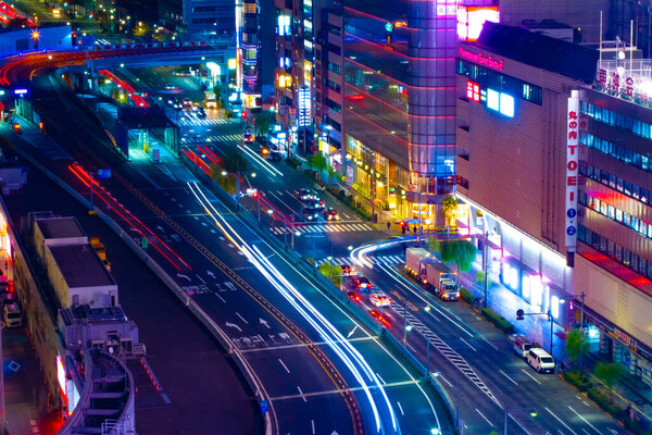 A night traffic jam at the crossing in Ginza long shot high angle. Chuo district Ginza Tokyo Japan - 11.19.2020 It is called Sukiyabashi crossing.