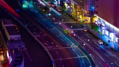 A night timelapse of the traffic jam at the crossing in Ginza long shot panning