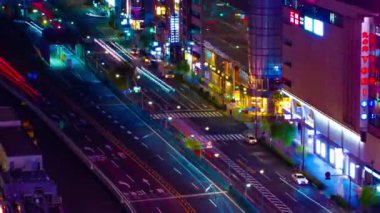 A night timelapse of the traffic jam at the crossing in Ginza long shot zoom